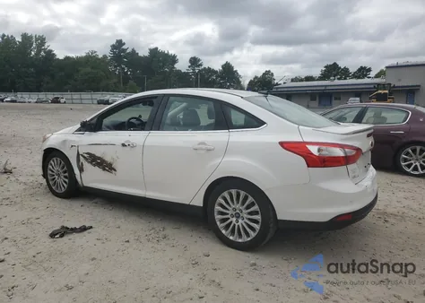 2012 Ford Focus Titanium from USA, damaged, VIN 1FAHP3J22CL351582